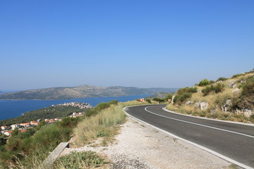 Fototapeta na wymiar Steep turn of the road on the Croatian coast