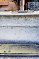 Loader bulldozer bucket for sand bulk cargo coal. front view. copy space. mining concept