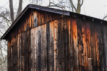 USA, Ohio -  April 26, 2018: Wooden Background, Old Rotten Board Shed, 18th Century Building, Ohio...
