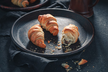 French croissants made of sweet flaky pastry and chocolate