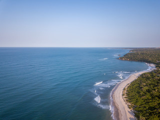 Fototapeta na wymiar Drone picture of waves hitting the beach.