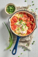 Spicy shakshuka served with fresh wholemeal bread