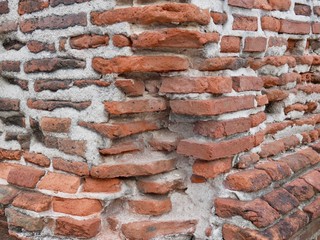 Broken stone wall close- up