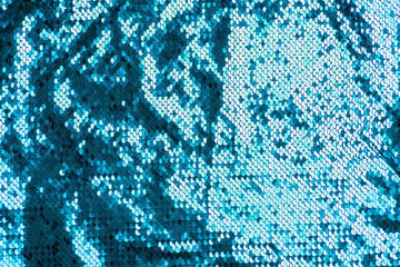 Abstract sequins blue glitter wave background texture