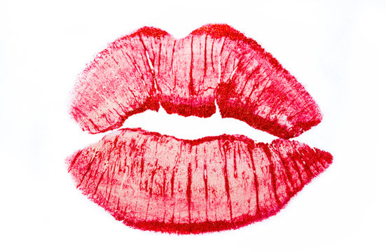 Print of female sexual lips, isolate. Imprint of red lipstick on a white background, close-up. Kiss.