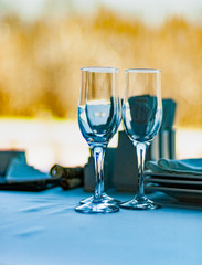Close-up three wine glasses stand on a table