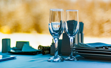Close-up three wine glasses stand on a table