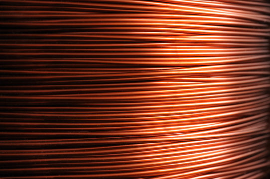 Close-up of a coil of red copper wire