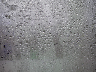 Frozen glass. Water drops