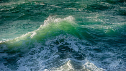 Fototapeta na wymiar Waves_Crash on to ta Beach in Cornwall_35