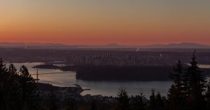 A sunrise time lapse of downtown Vancouver, Stanley Park, and the Lions Gate Bridge as seen from Cypress Mountain.