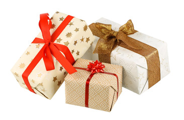Three gift boxes with gold and red bows. Isolated picture.