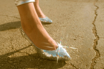 Close up of feet in shiny sequin shoes
