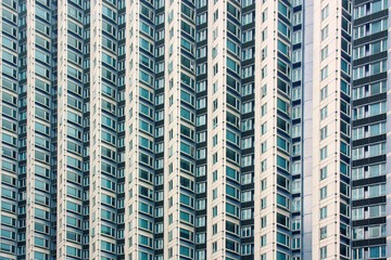 Giant multi-apartments skyscraper. Background or texture, shot in Hong kong,China, Asia Public apartment block in Hong Kong.