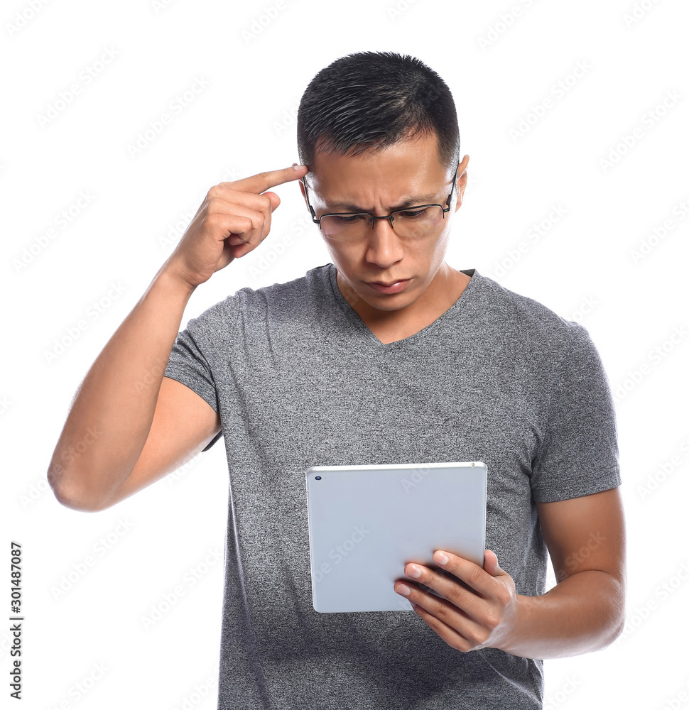 Poster male asian programmer with tablet computer on white background