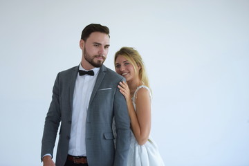 Couples who are getting married are happy when they try to get married at the studio.