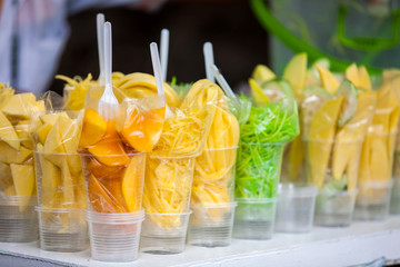 Street sell of mango in the city of Cali in Colombia