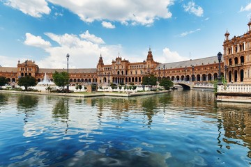 Seville Plaza de Espana over water - obrazy, fototapety, plakaty