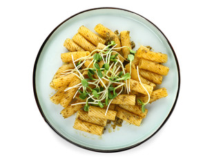 Plate with tasty pasta and pesto sauce on white background