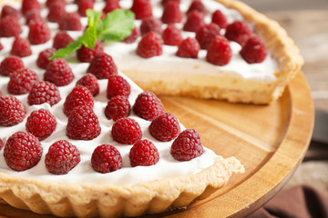 Tasty berry pie on board, closeup