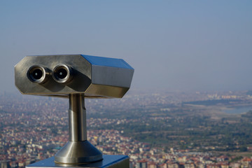 Sightseeing scenic binoculars with denizli city scene