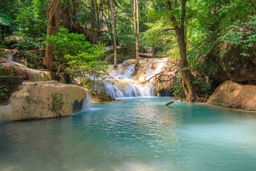 Naklejka premium Waterfalls In Deep Forest at Erawan Waterfall in National Park Kanchanaburi Thailand