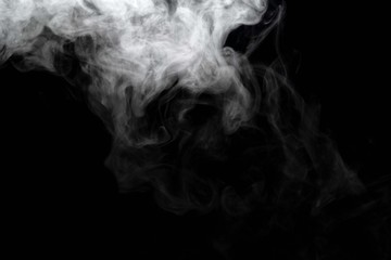 Abstract powder or smoke isolated on black background.