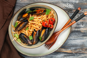 Pasta Mussels with herbs and tomatoes in a bowl