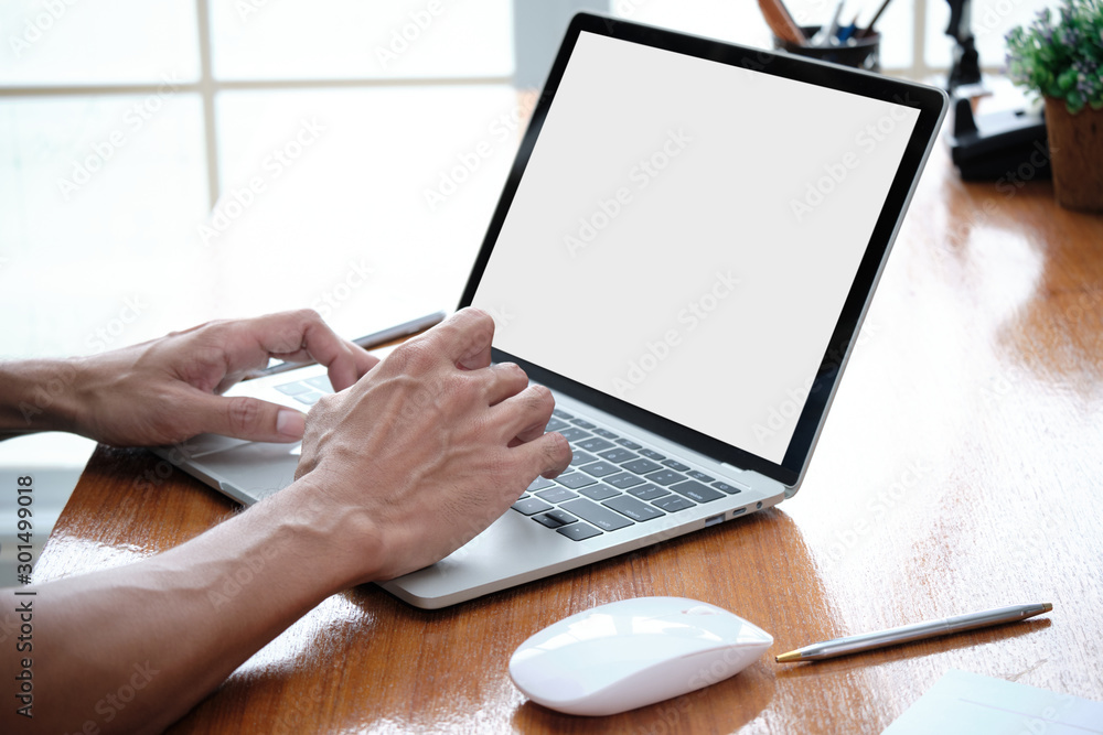 Poster hands of an online business entrepreneur is typing a keyboard on the laptop for checking order list 
