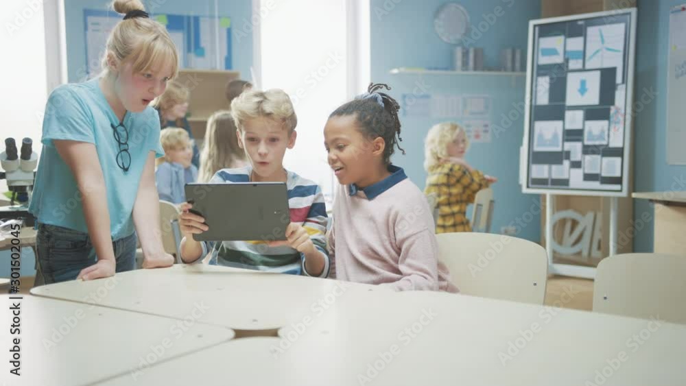 Poster elementary school computer science class: two girls and boy use digital tablet computer with augment