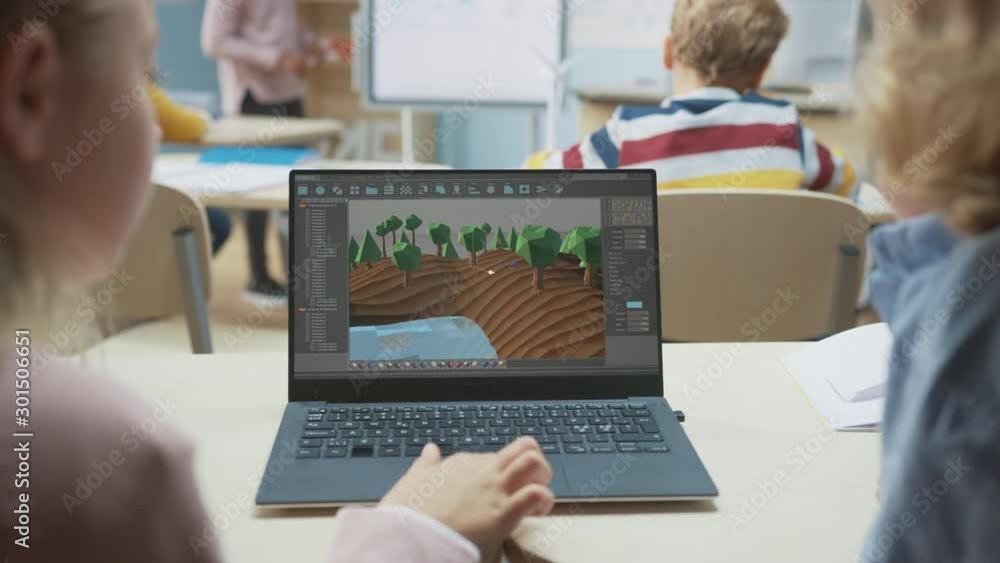 Poster elementary school computer science classroom: over the shoulder view of two kids using laptop comput