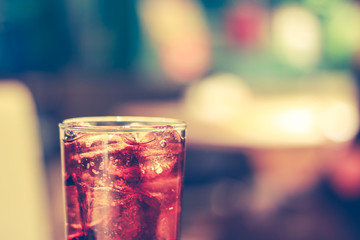 Close up of cola in the restaurant with blur background. Drink and health concept.