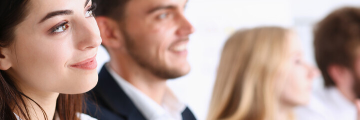 Beautiful smiling woman portrait with group