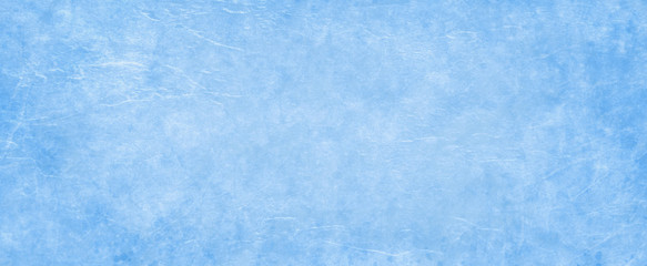 Old psterl blue paper parchment background design with distressed vintage stains and ink spatter and white faded shabby center, elegant antique sky blue color