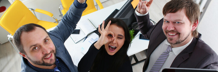 portrait of cheerful young businessmen in office