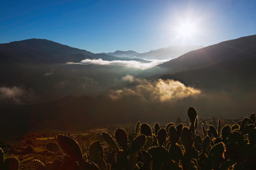 High Atlas Mountains with morning fog.