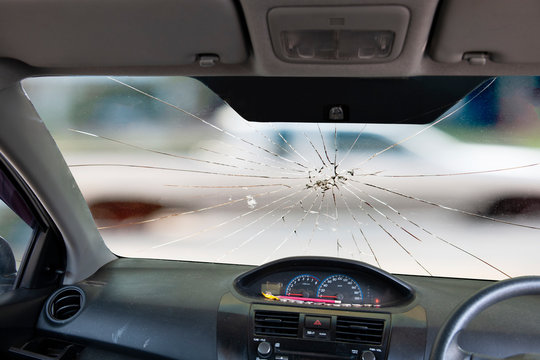 Broken car windshield. Accident of car. Selective focus. Front safety glass car are broken. image for car, vehicle, transportation, accident concept.
