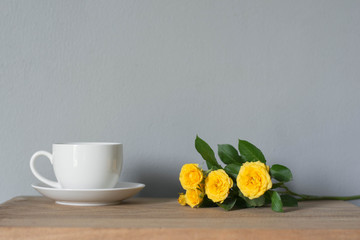 Coffee espresso on wood table nature background in garden,warm tone