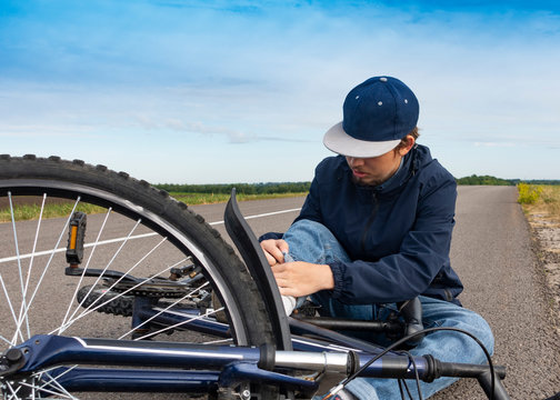 Teenager Fell Off Bicycle. Boy Keeps Self For Bruised Knee.