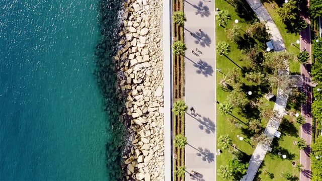Flying over promenade alley at molos area in Limassol. Cyprus