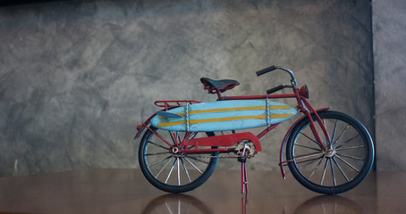 The red bicycle with the gray background