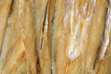Dried salted fishes textures background