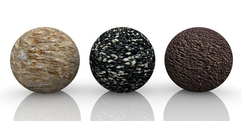 Three different stone balls