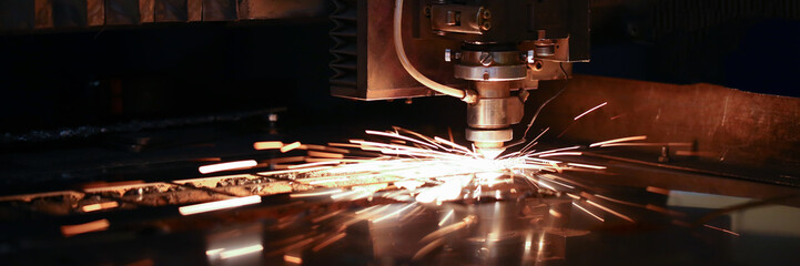 Sparks fly out machine head for metal processing