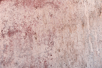 Texture of a concrete wall with cracks and scratches which can be used as a background