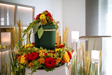 urn within coronal on funeral 