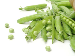 Fresh peas isolated on white background