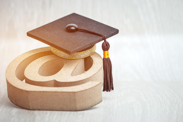 Education University of online training courses or distance learning in abroad international study concept: Graduation cap on email address symbol.Communication school can learn by internet technology