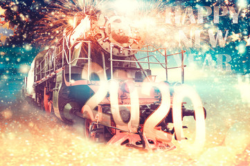 New Year's locomotive on a snowy, night plain