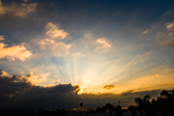 Sunbeams Streak from Clouds at Sunrise - 1